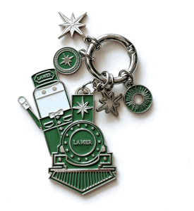 LA MER Limited Edition Train Conductor Figurine Custom Metal Keychain
